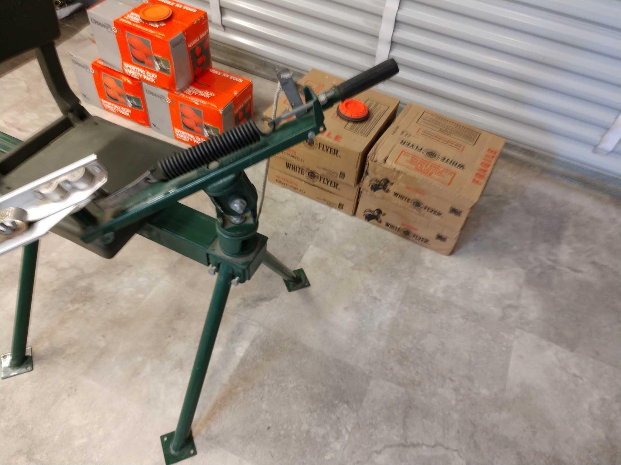 Truck hitch mounted clay pigeon thrower