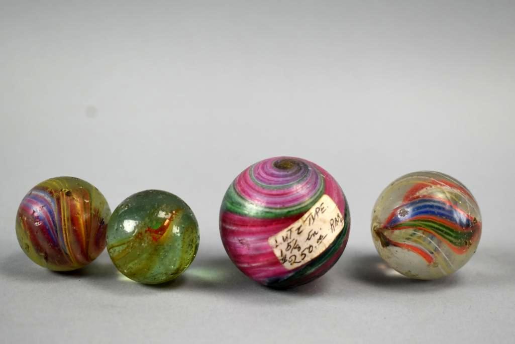 4 Antique Glass Marbles