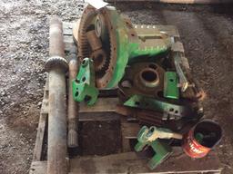 Pallet of John Deere 4650 tractor parts. (includes planetary parts; brake discs & axle shaft.)