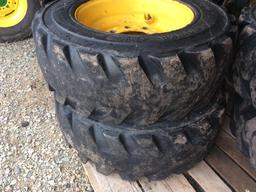 10-16.5 NHS skid loader tires mounted on 10-hole rims. (4 TIMES THE MONEY)