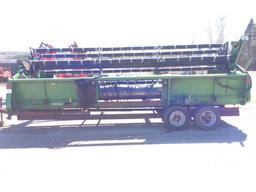 John Deere 220 18ft grain head on tandem axle head cart; s/n 482097.