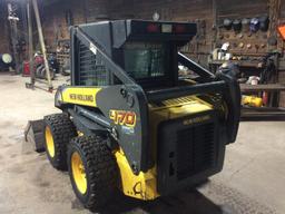 2006 New Holland L170 skid loader; cab w/ heat; hyd quick coupler; aux. hyds; GP bucket w/ BOCE;