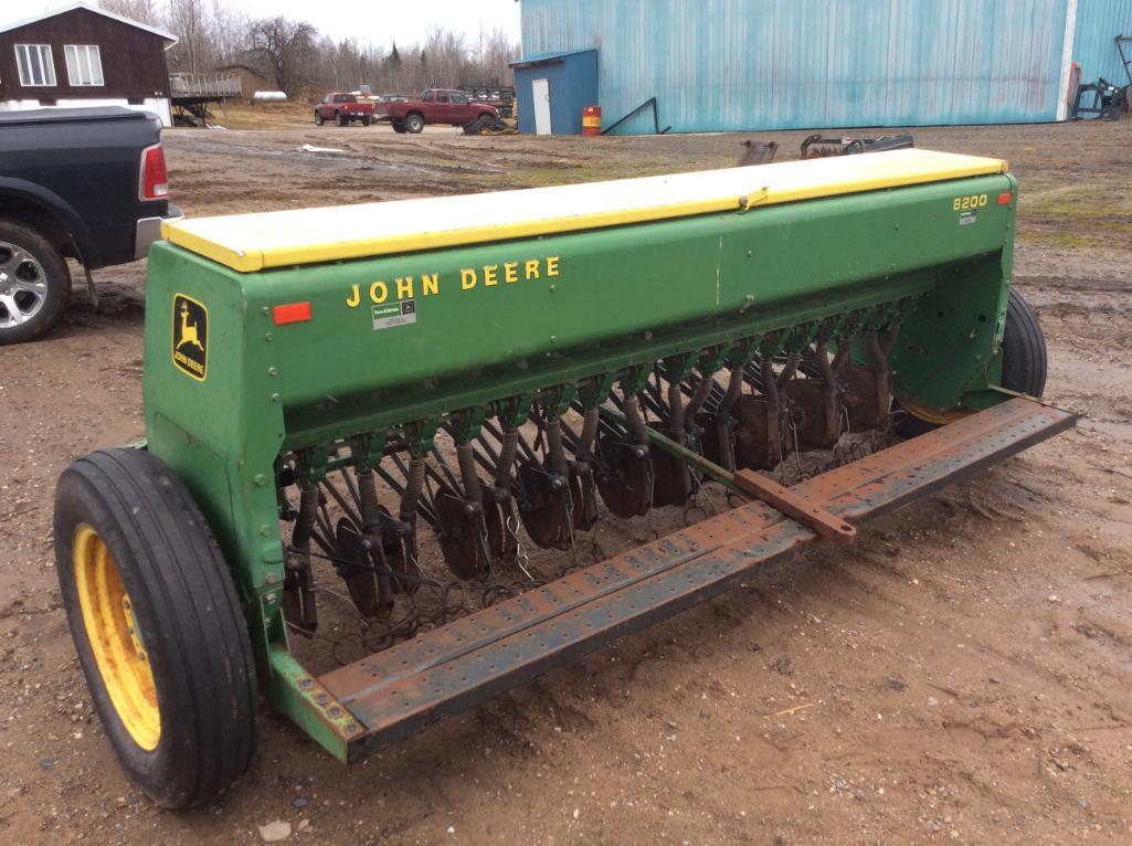 John Deere 8300 grain drill; 10ft; single disk; cover; s/n 038250N.