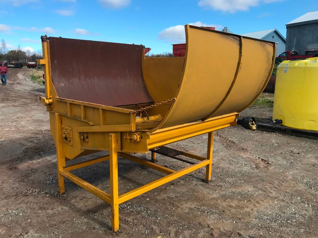 Shop built stationary bale shredder w/ PTO drive.