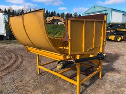 Shop built stationary bale shredder w/ PTO drive.