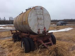 Steel pull type wagon; 70in x 12ft water tank; pintle hitch; dual wheels; 9.00R20 tires.