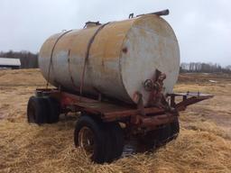 Steel pull type wagon; 70in x 12ft water tank; pintle hitch; dual wheels; 9.00R20 tires.