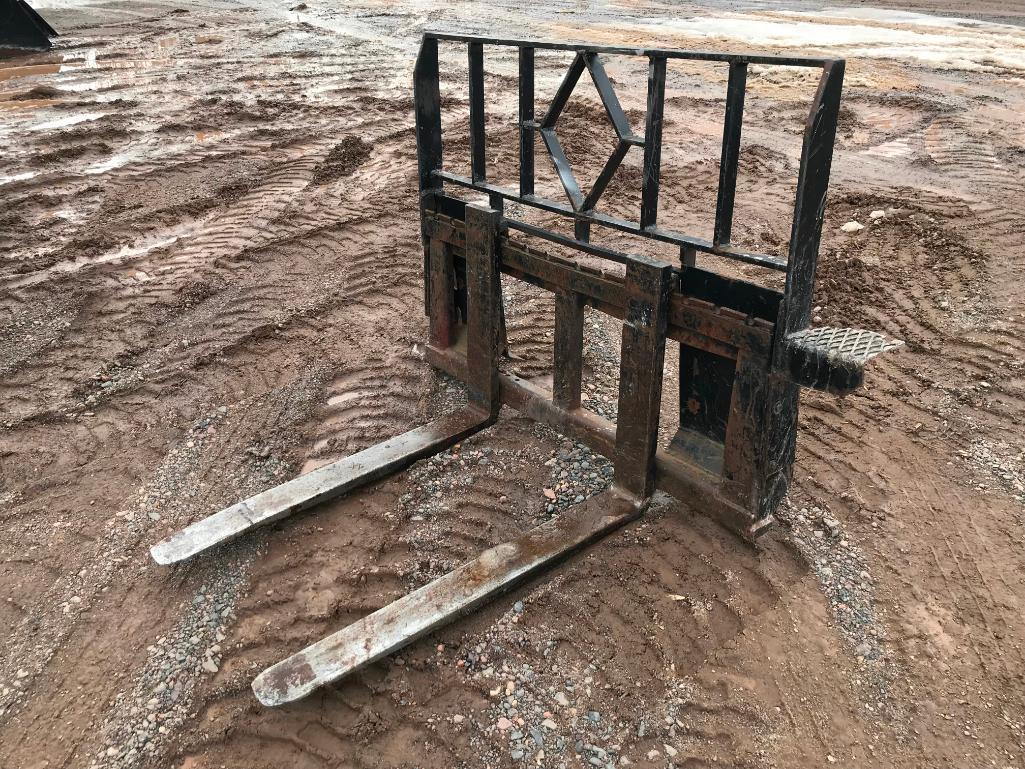 Skid loader mount pallet forks.