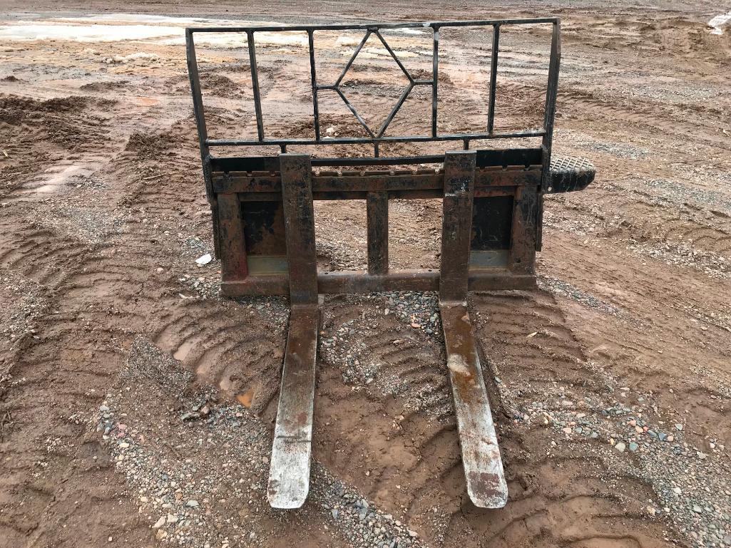 Skid loader mount pallet forks.