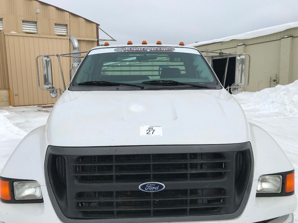 2003 Ford F-650 XLT flatbed truck; single axle; Cummins 5.9L diesel engine; manual trans; 12ft steel