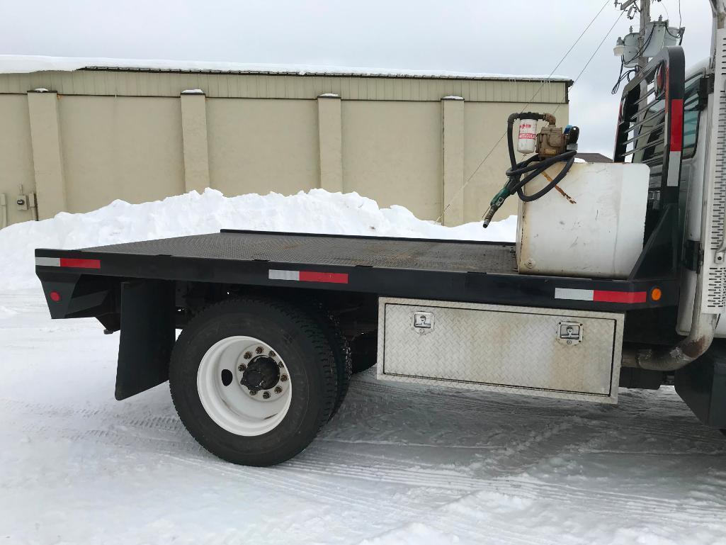 2003 Ford F-650 XLT flatbed truck; single axle; Cummins 5.9L diesel engine; manual trans; 12ft steel