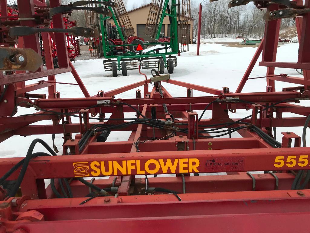 Sunflower 5552-51 56ft field cultivator; hyd fold; walking tandem wheels; s/n 5596-104.
