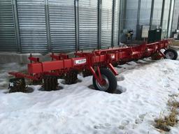 Lilliston 12-row 3pt mount rotary cultivator; 30in spacing; 4-spider units; hyd fold; gauge wheels.