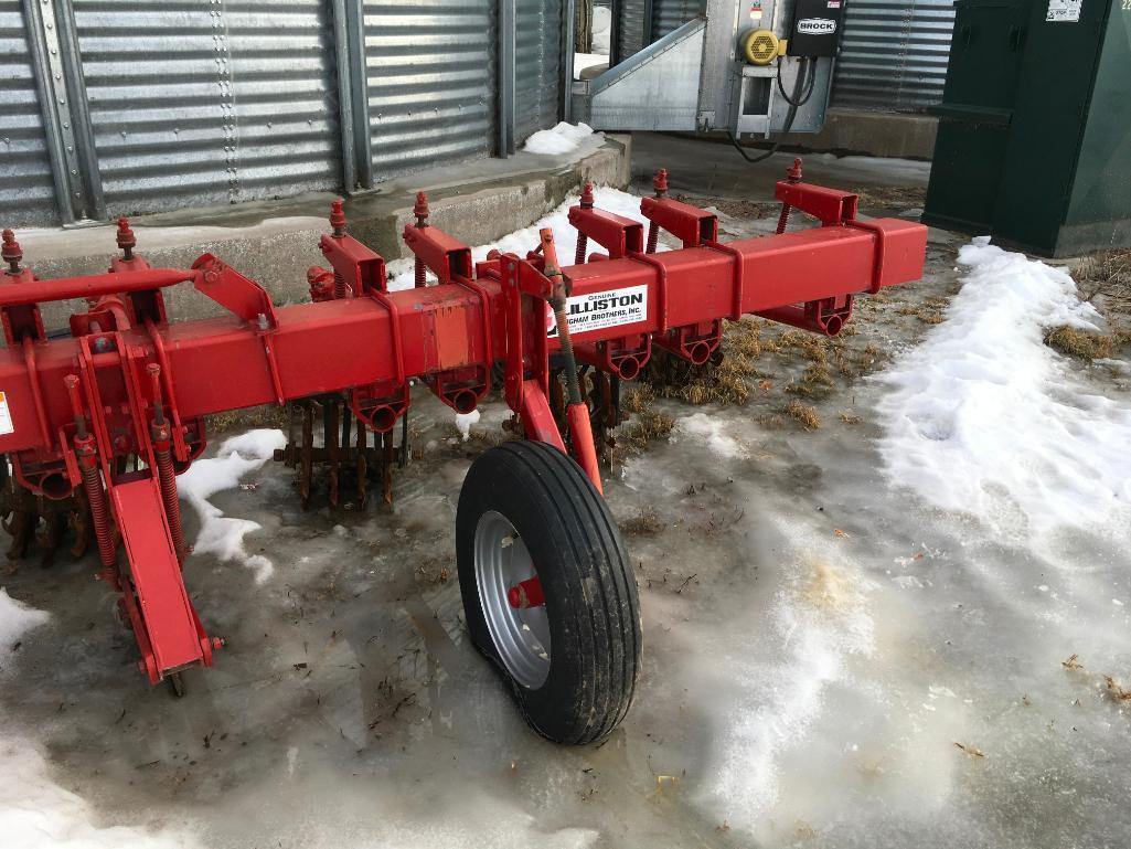 Lilliston 12-row 3pt mount rotary cultivator; 30in spacing; 4-spider units; hyd fold; gauge wheels.