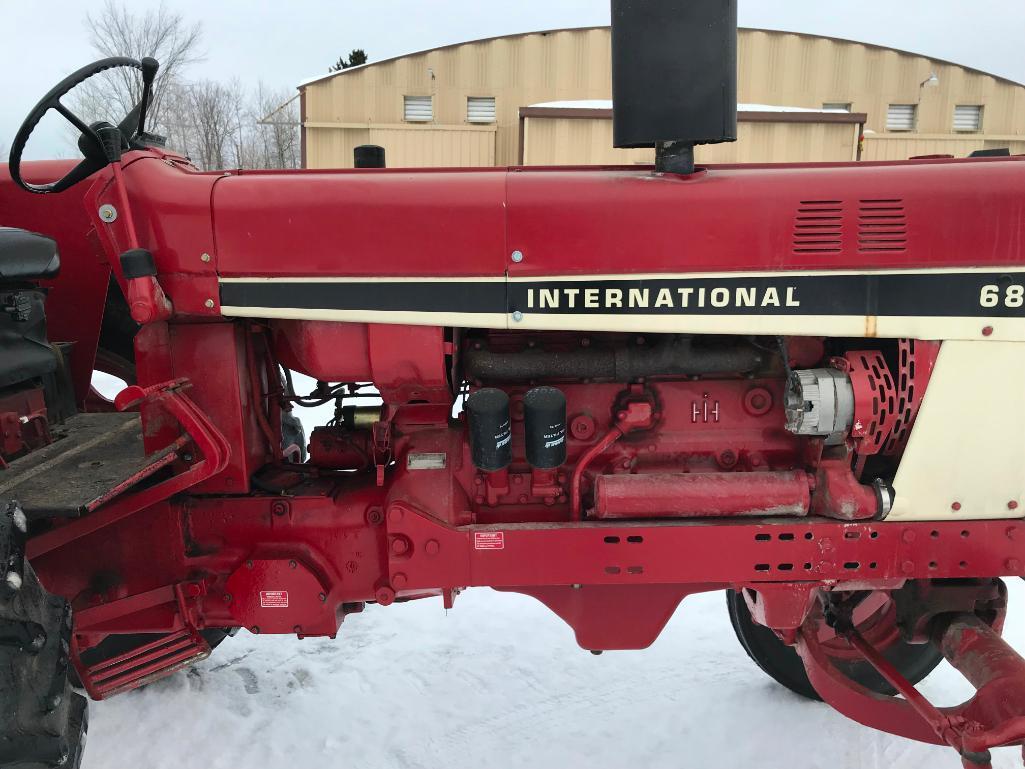 1977 IHC 686 tractor; open station; diesel; TA trans.; 13.6 x 38 rear tires; 2-hyds; rock box; 7,407