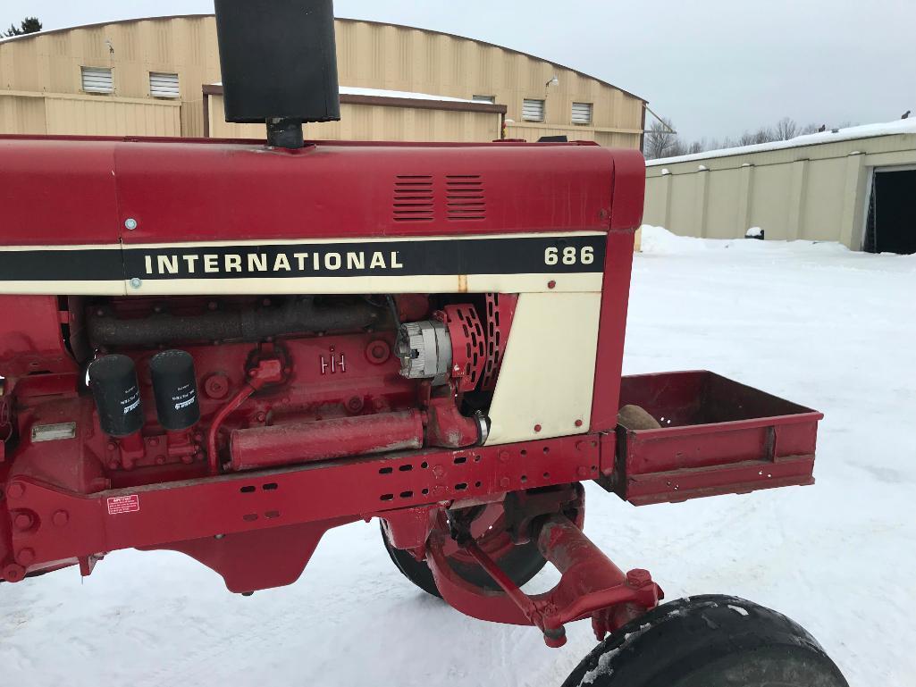 1977 IHC 686 tractor; open station; diesel; TA trans.; 13.6 x 38 rear tires; 2-hyds; rock box; 7,407