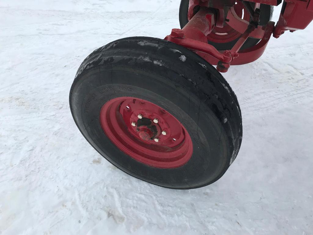 1977 IHC 686 tractor; open station; diesel; TA trans.; 13.6 x 38 rear tires; 2-hyds; rock box; 7,407