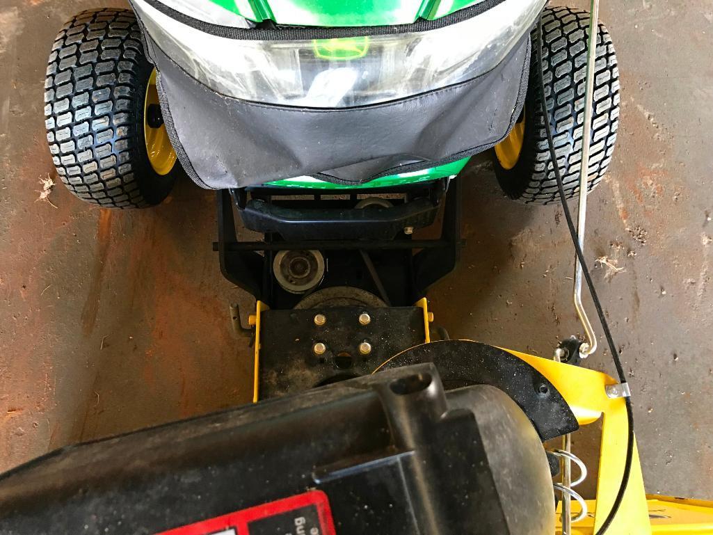 2016 John Deere X380 lawn tractor; 22 hp. gas engine; hydro; 44in front mount snow blower; 48in