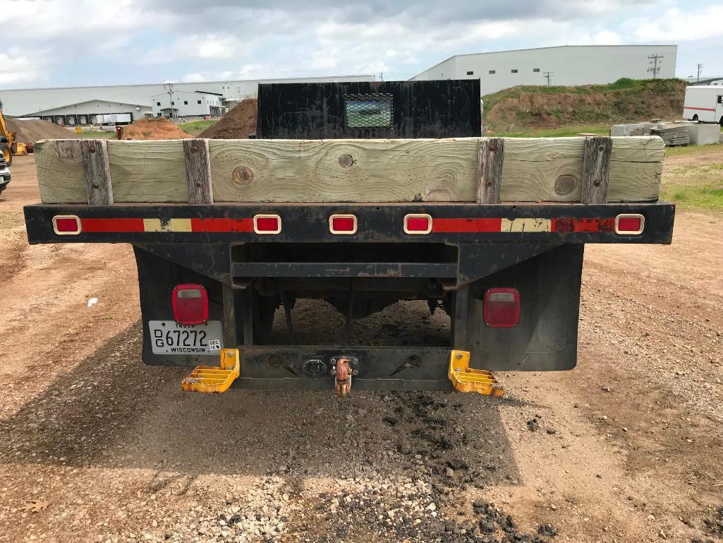 (TITLE) 1994 Ford Super Duty flatbed truck; 2x4; 7.3L diesel engine; auto; DRW; 14ft stake rack;