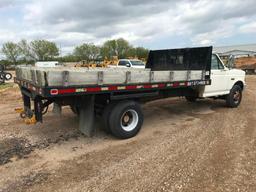 (TITLE) 1994 Ford Super Duty flatbed truck; 2x4; 7.3L diesel engine; auto; DRW; 14ft stake rack;