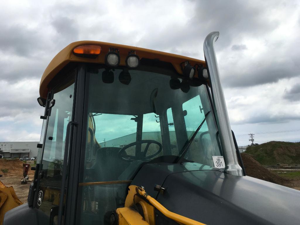 2006 John Deere 310SG tractor loader backhoe; cab w/ AC; ext hoe; powershift trans; ride control;