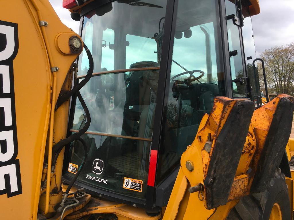 2006 John Deere 310SG tractor loader backhoe; cab w/ AC; ext hoe; powershift trans; ride control;