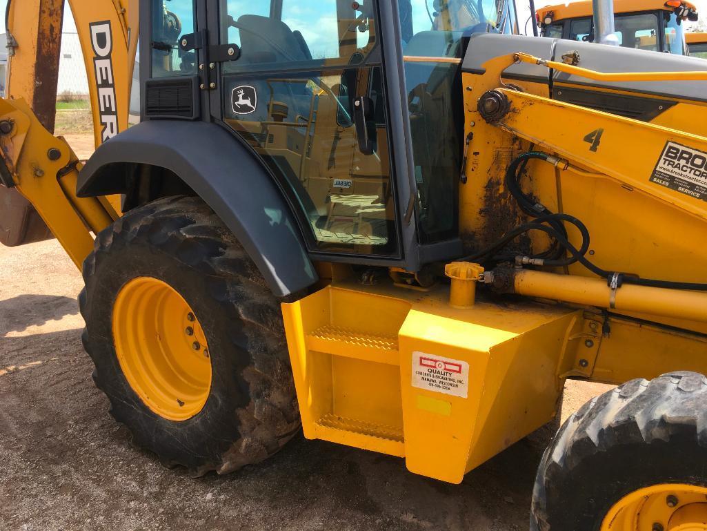 2006 John Deere 310SG tractor loader backhoe; cab w/ AC; ext hoe; powershift trans; ride control;