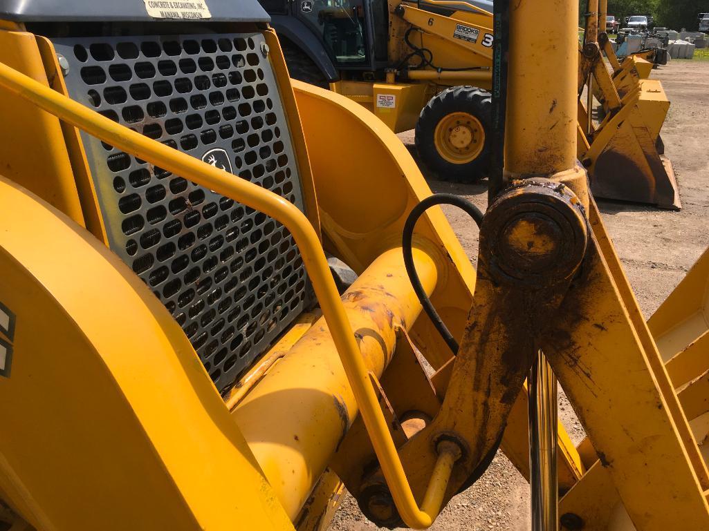 2006 John Deere 310SG tractor loader backhoe; cab w/ AC; ext hoe; powershift trans; ride control;