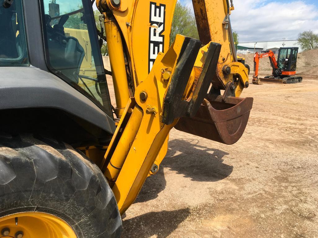 2006 John Deere 310SG tractor loader backhoe; cab w/ AC; ext hoe; powershift trans; ride control;