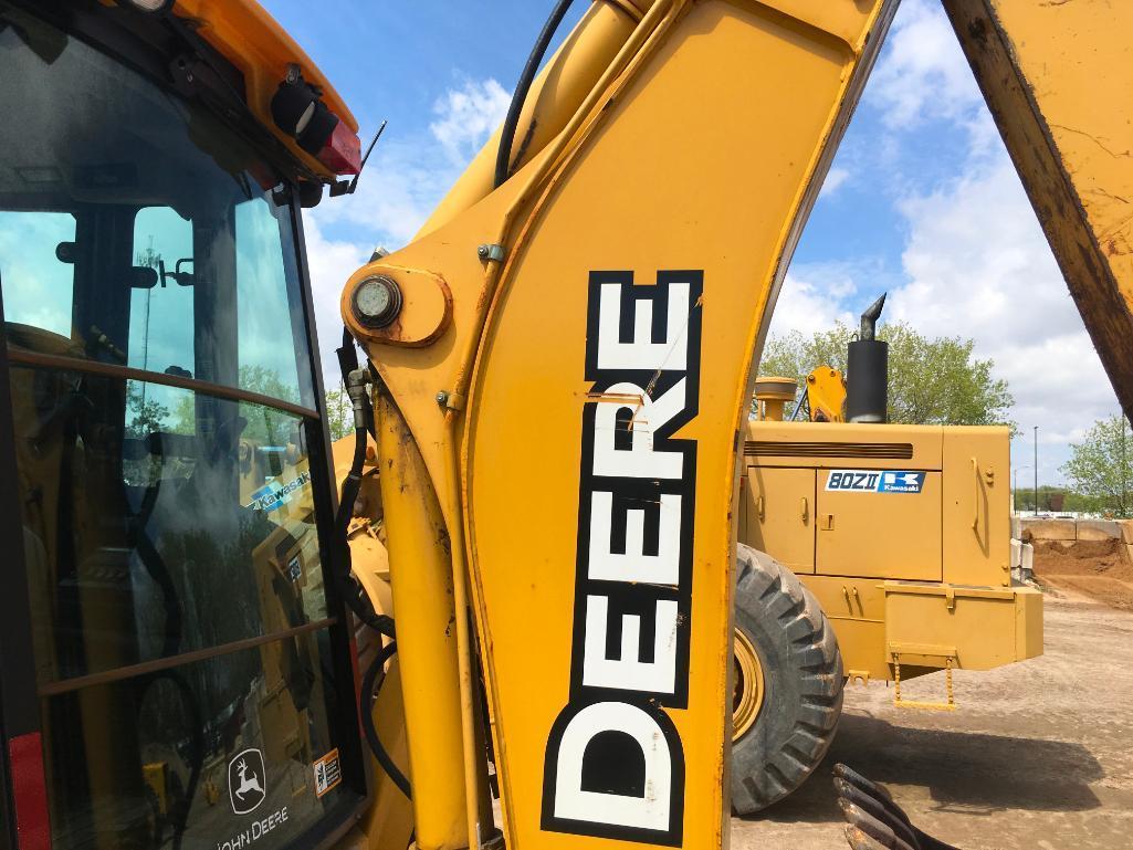 2006 John Deere 310SG tractor loader backhoe; cab w/ AC; ext hoe; powershift trans; ride control;