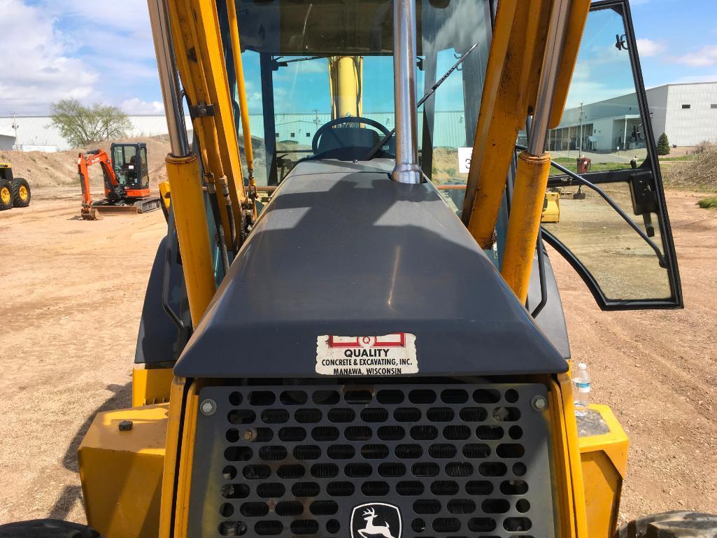 2006 John Deere 310SG tractor loader backhoe; cab w/ AC; ext hoe; powershift trans; ride control;