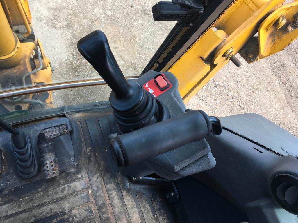 2006 John Deere 310SG tractor loader backhoe; cab w/ AC; ext hoe; powershift trans; ride control;