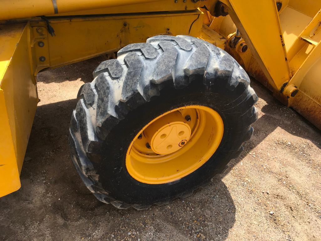 2006 John Deere 310SG tractor loader backhoe; cab w/ AC; ext hoe; powershift trans; ride control;