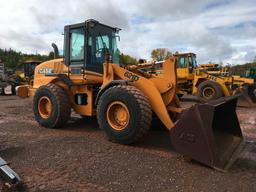 2004 Case 621D wheel loader; cab w/ AC; 20.5R25 tires; ACS quick coupler bucket; ride control; 7,957