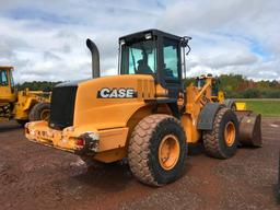 2004 Case 621D wheel loader; cab w/ AC; 20.5R25 tires; ACS quick coupler bucket; ride control; 7,957