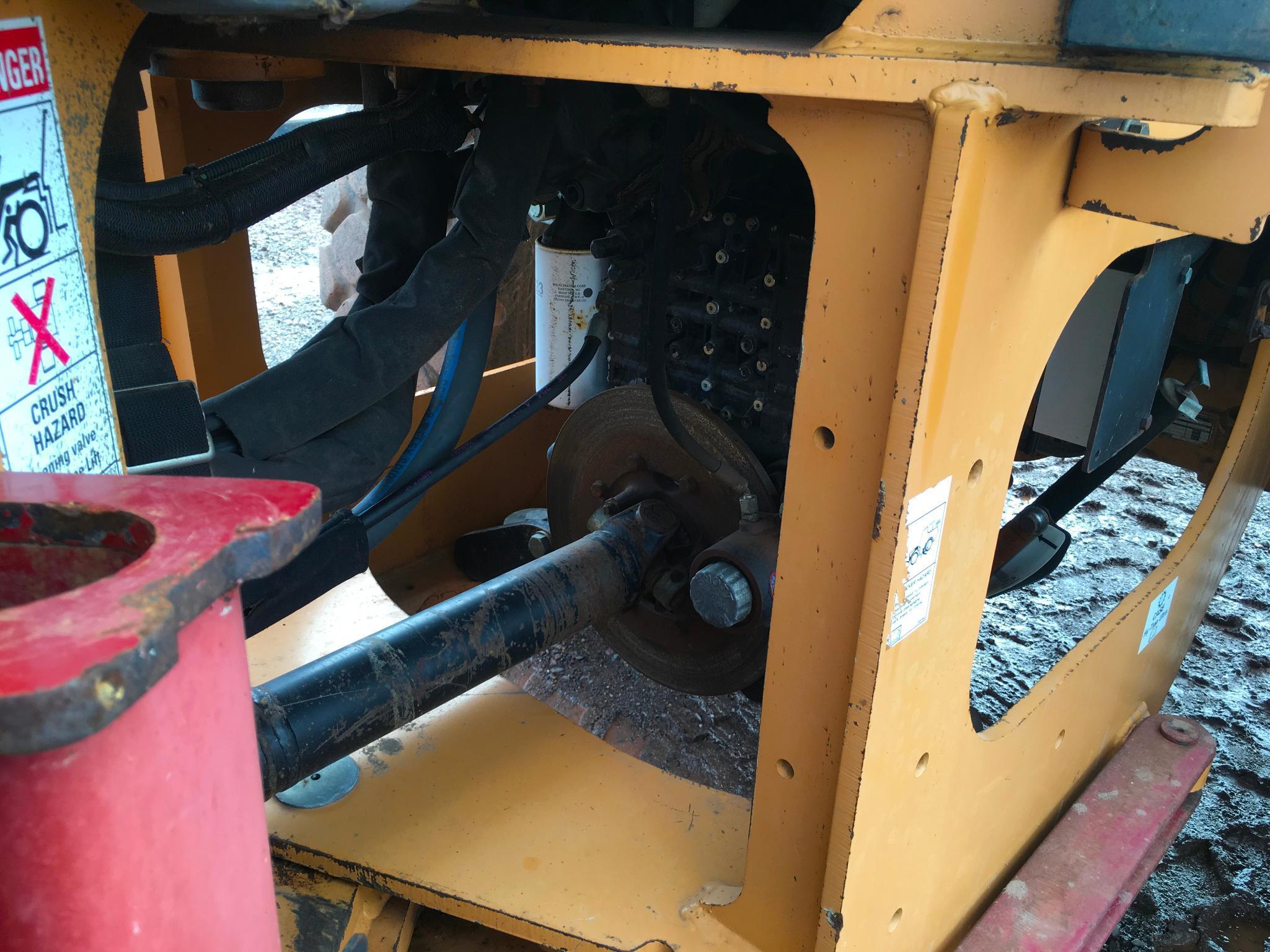 2004 Case 621D wheel loader; cab w/ AC; 20.5R25 tires; ACS quick coupler bucket; ride control; 7,957