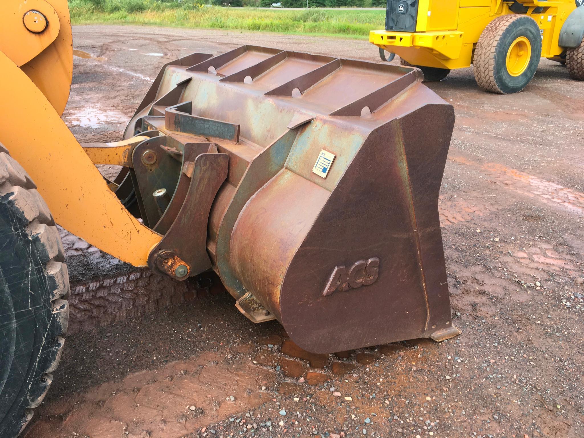 2004 Case 621D wheel loader; cab w/ AC; 20.5R25 tires; ACS quick coupler bucket; ride control; 7,957