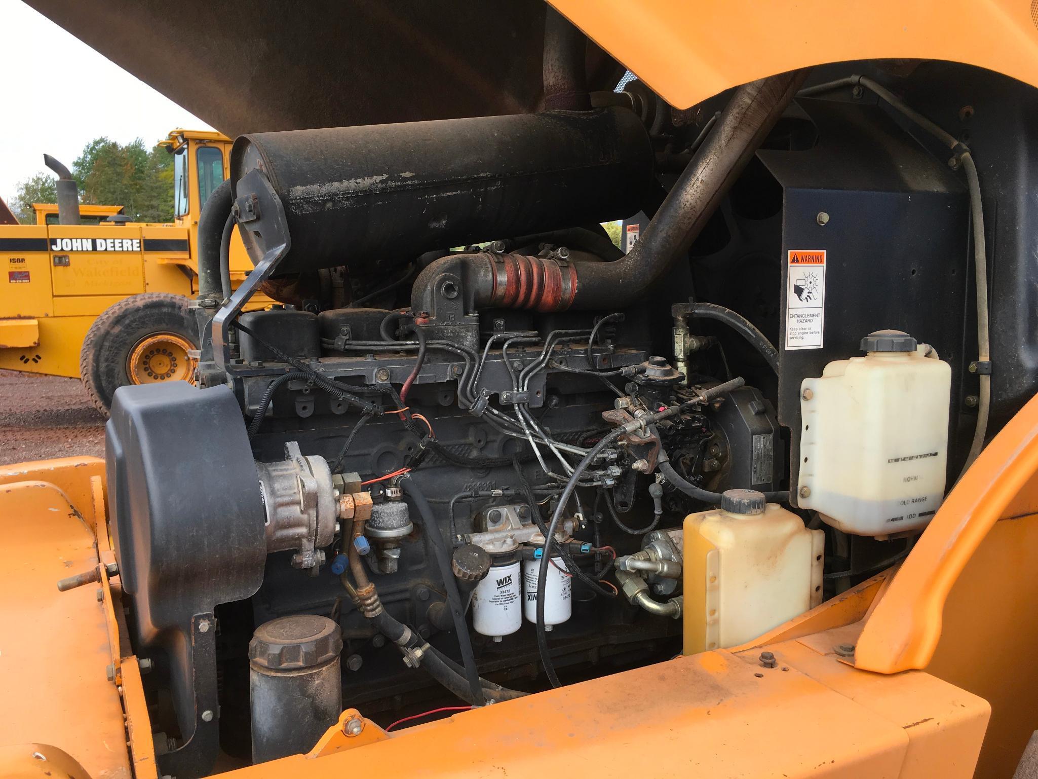 2004 Case 621D wheel loader; cab w/ AC; 20.5R25 tires; ACS quick coupler bucket; ride control; 7,957