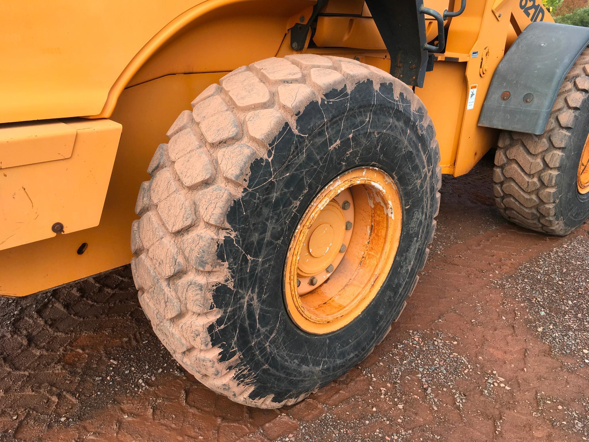 2004 Case 621D wheel loader; cab w/ AC; 20.5R25 tires; ACS quick coupler bucket; ride control; 7,957