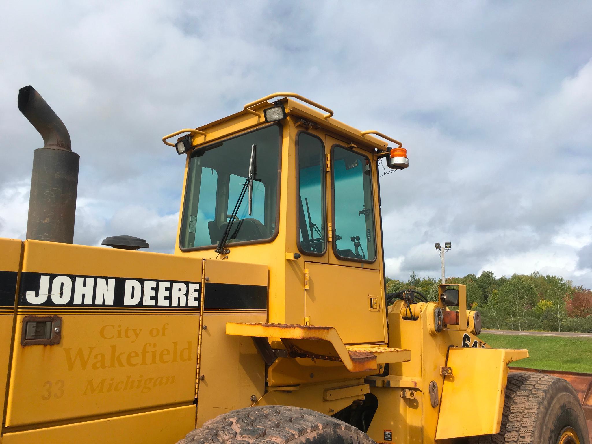 1997 John Deere 644G wheel loader; cab w/ heat; 23.5R x 25 radial tires; 3 yard ACS quick coupler