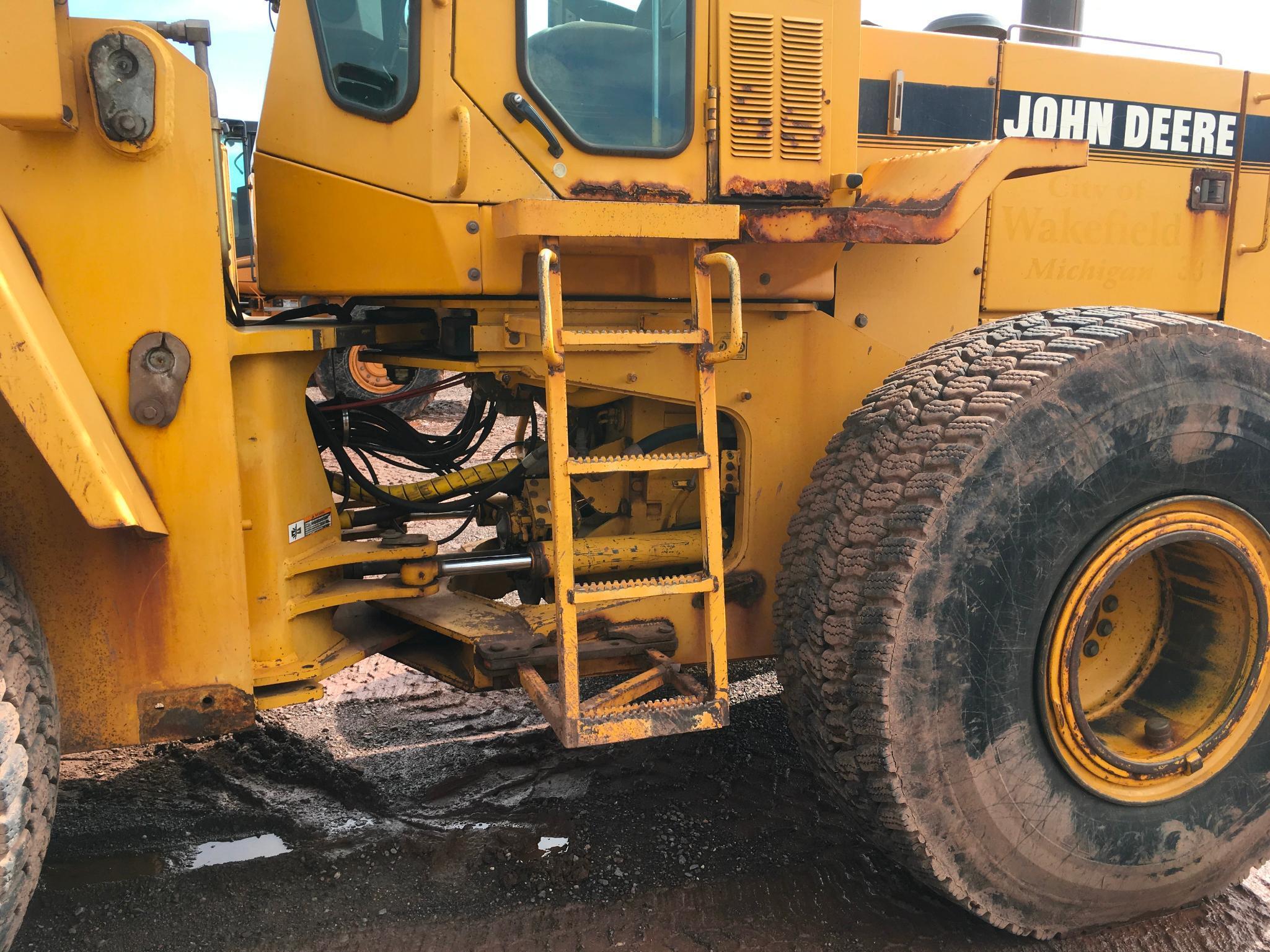 1997 John Deere 644G wheel loader; cab w/ heat; 23.5R x 25 radial tires; 3 yard ACS quick coupler