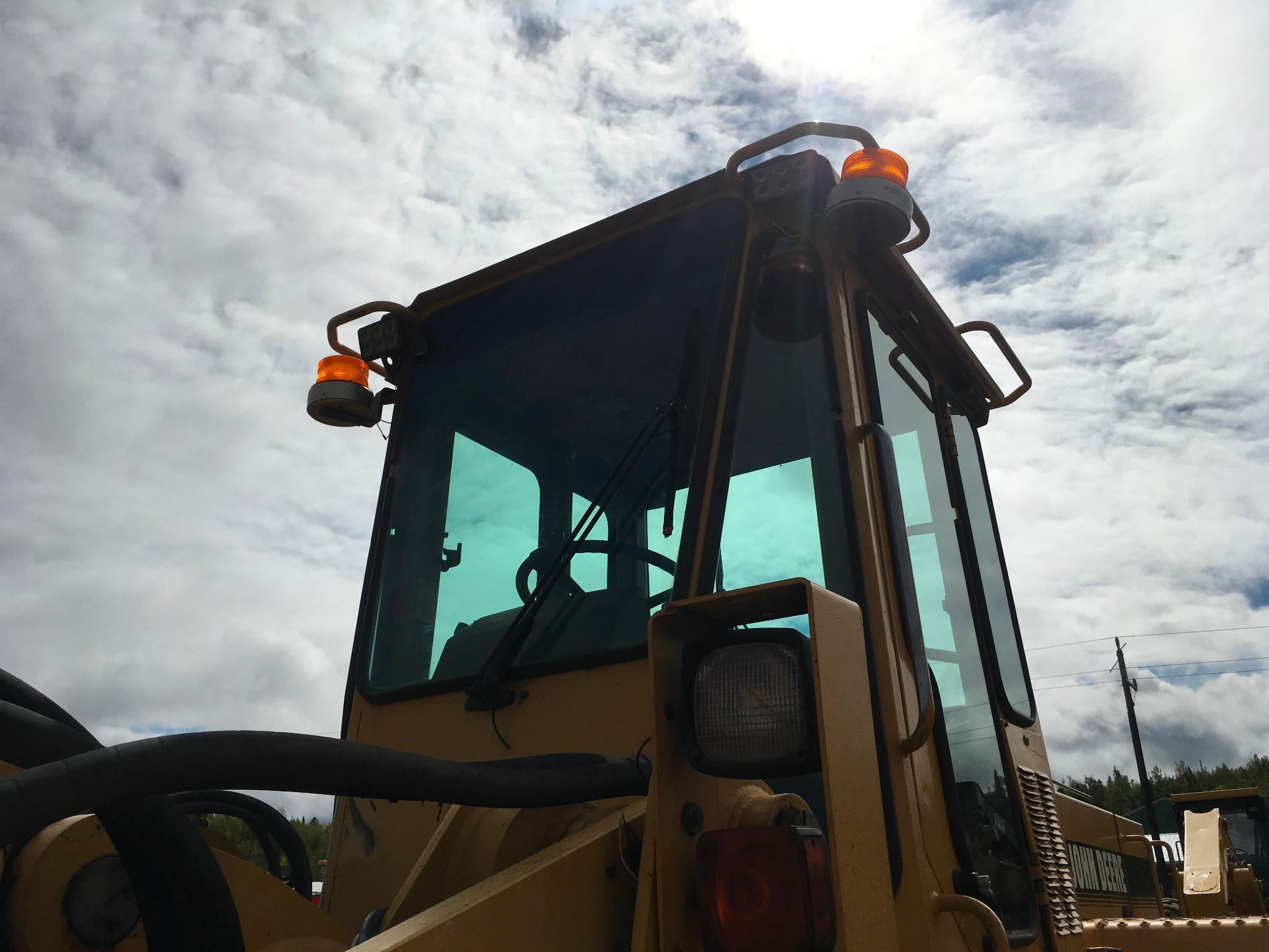 1997 John Deere 644G wheel loader; cab w/ heat; 23.5R x 25 radial tires; 3 yard ACS quick coupler