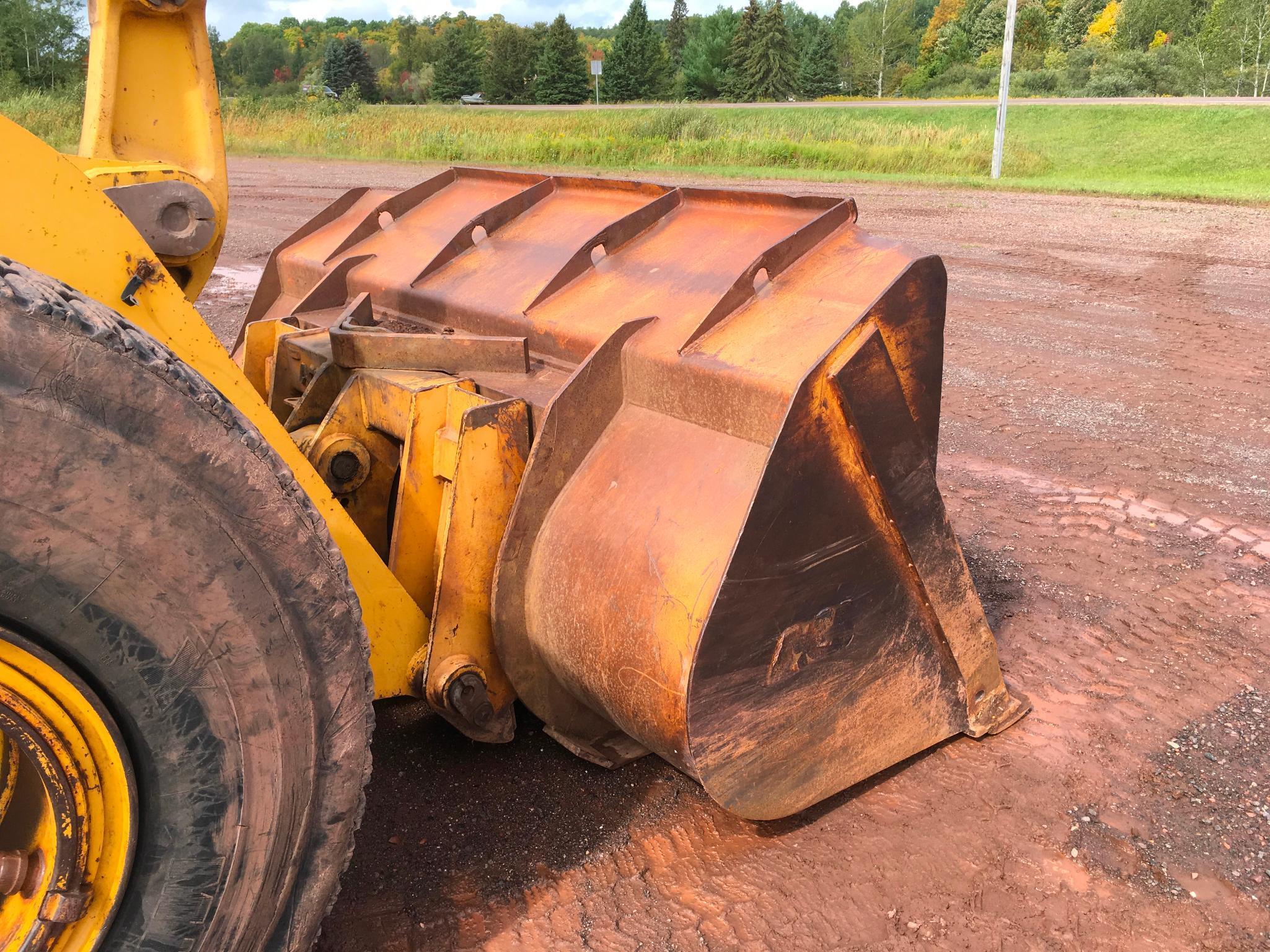 1997 John Deere 644G wheel loader; cab w/ heat; 23.5R x 25 radial tires; 3 yard ACS quick coupler