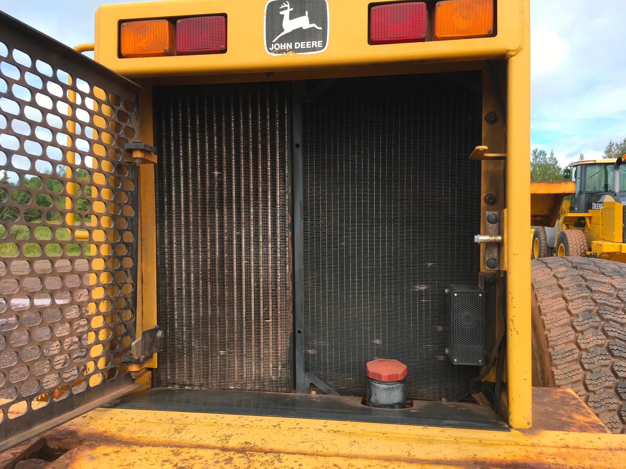 1997 John Deere 644G wheel loader; cab w/ heat; 23.5R x 25 radial tires; 3 yard ACS quick coupler