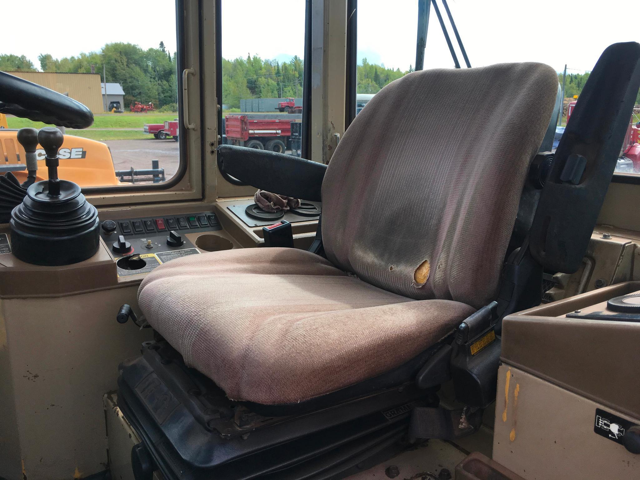 1997 John Deere 644G wheel loader; cab w/ heat; 23.5R x 25 radial tires; 3 yard ACS quick coupler