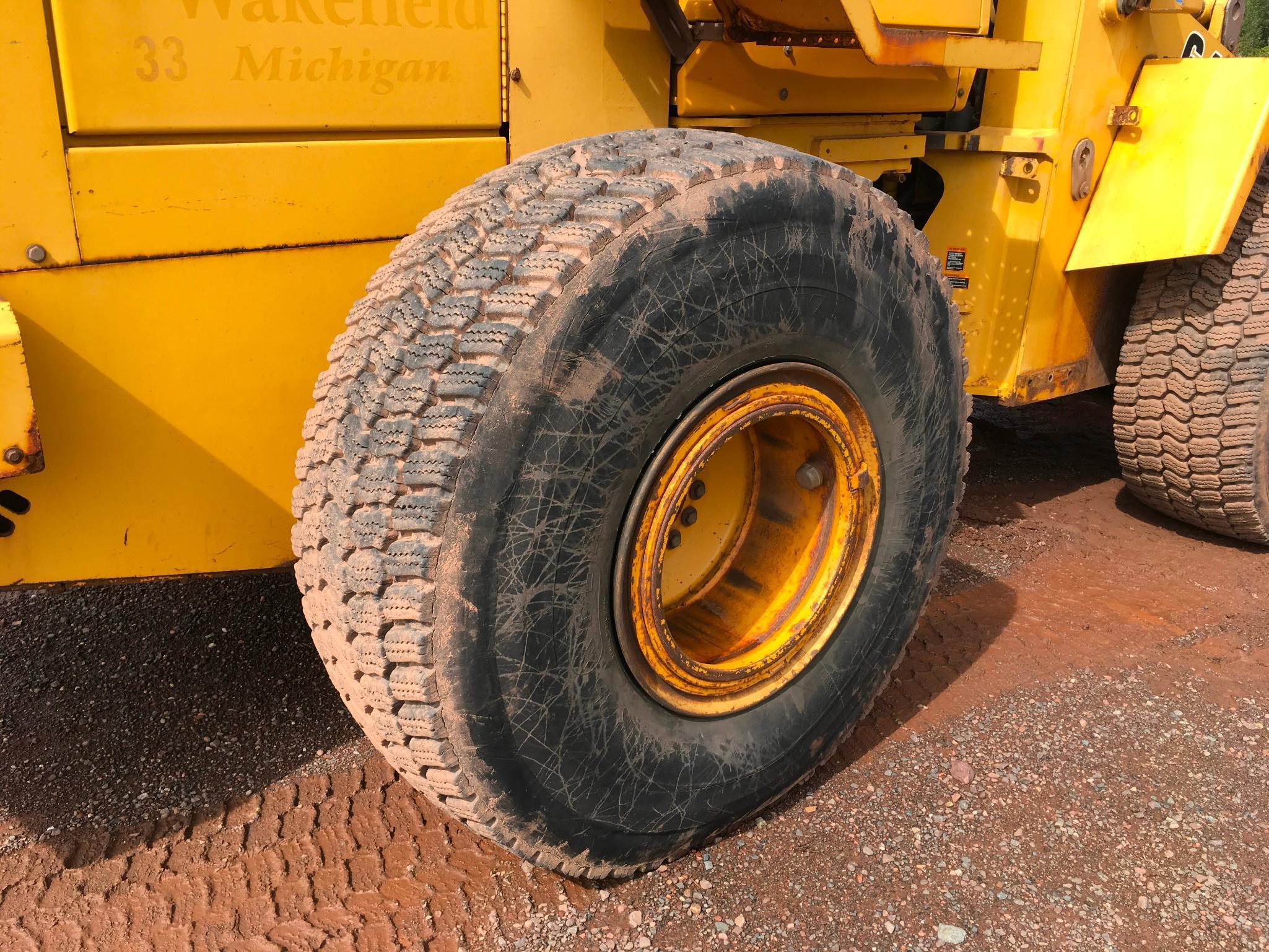 1997 John Deere 644G wheel loader; cab w/ heat; 23.5R x 25 radial tires; 3 yard ACS quick coupler