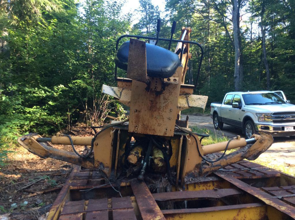 John Deere backhoe for John Deere 550 crawler dozer.