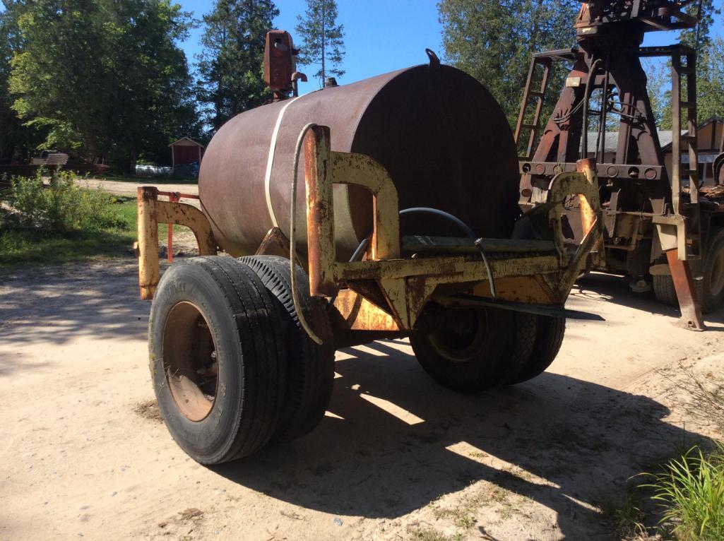 1,000-gallon fuel tank w/ pump on single axle trailer; duals; pintle hitch.