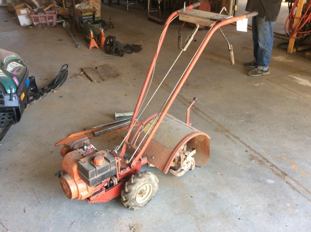 Tory Bilt Junior rear-tine roto-tiller.