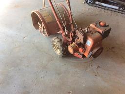 Tory Bilt Junior rear-tine roto-tiller.